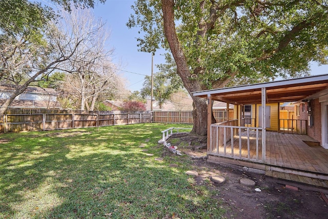 view of yard with a deck