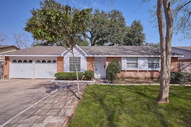 ranch-style house featuring a garage and a front yard