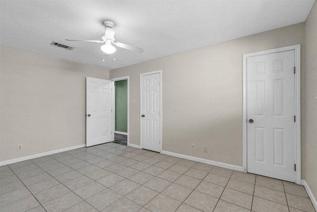 unfurnished room featuring ceiling fan