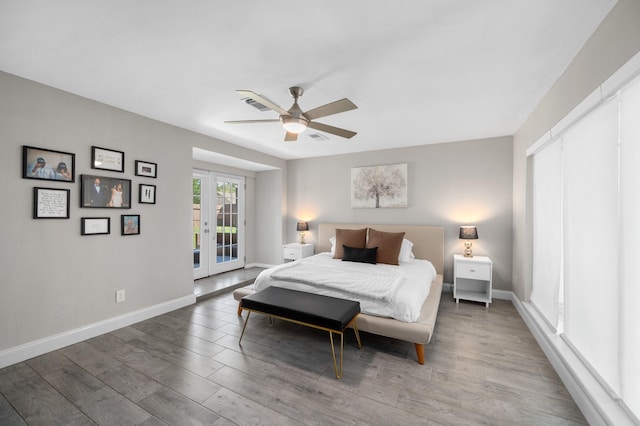 bedroom featuring hardwood / wood-style floors, french doors, ceiling fan, and access to exterior