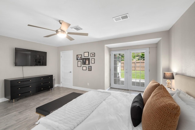 bedroom with french doors, ceiling fan, light hardwood / wood-style flooring, and access to outside