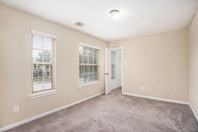 view of carpeted spare room