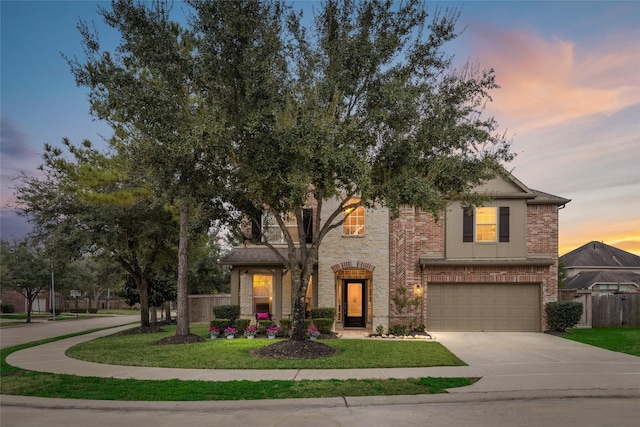 view of front of house featuring a garage, stone siding, fence, and concrete driveway