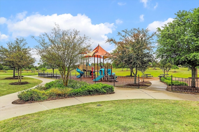 community playground with a lawn