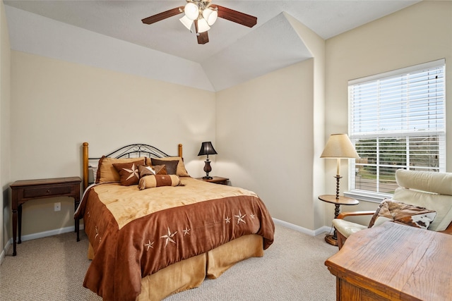 bedroom with lofted ceiling, carpet floors, ceiling fan, and baseboards