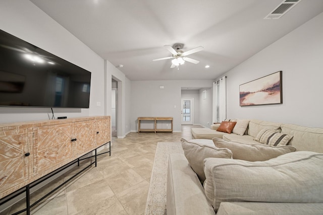 living room featuring ceiling fan