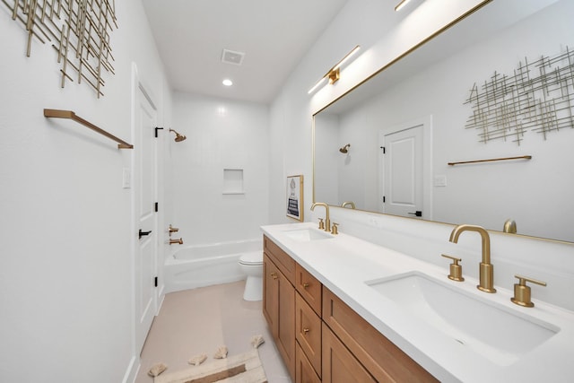 full bathroom with shower / bathing tub combination, vanity, tile patterned floors, and toilet