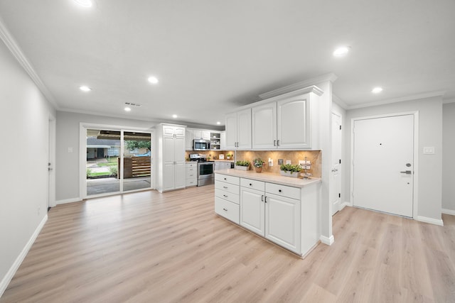 kitchen with stainless steel appliances, white cabinetry, ornamental molding, and decorative backsplash