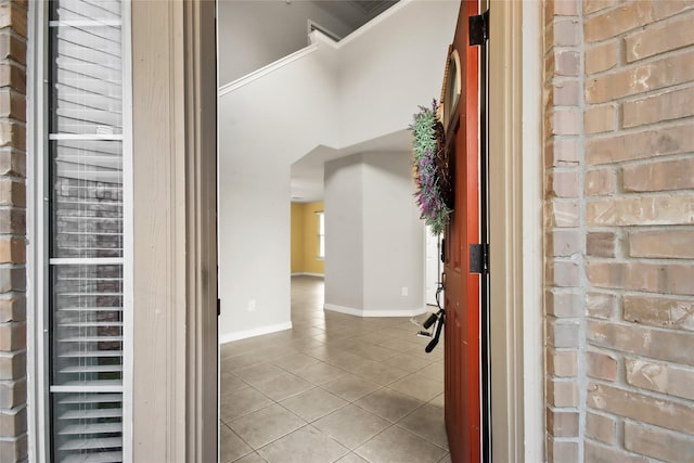 interior space featuring a towering ceiling