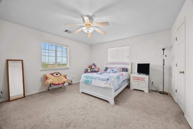 carpeted bedroom with ceiling fan