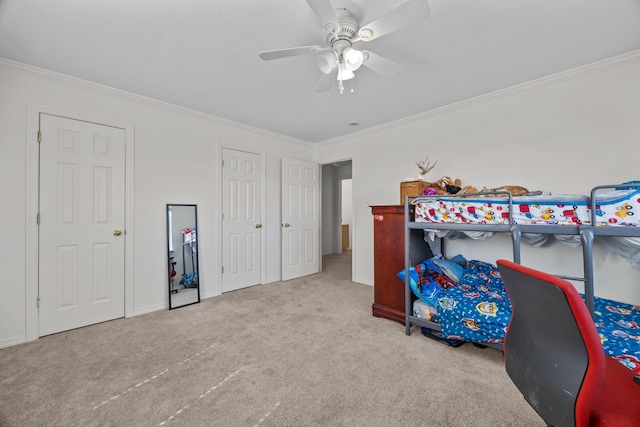 bedroom with crown molding, light colored carpet, and ceiling fan