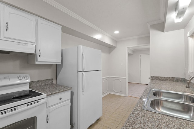 kitchen with sink, white appliances, light tile patterned floors, white cabinetry, and ornamental molding