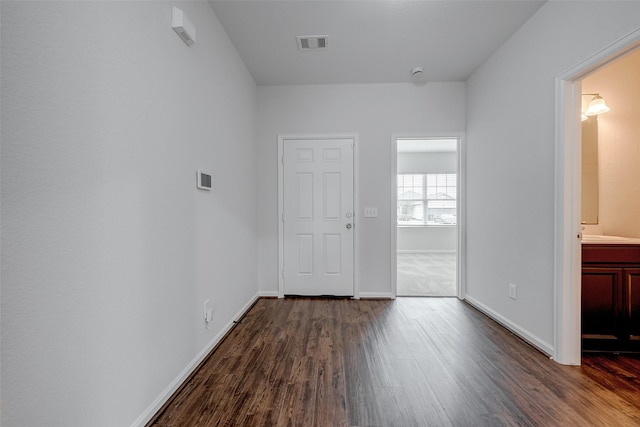 interior space featuring dark wood-type flooring