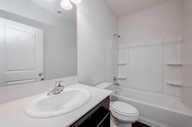 full bathroom featuring  shower combination, toilet, and vanity