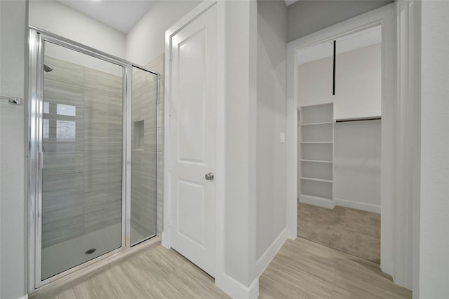 bathroom featuring walk in shower