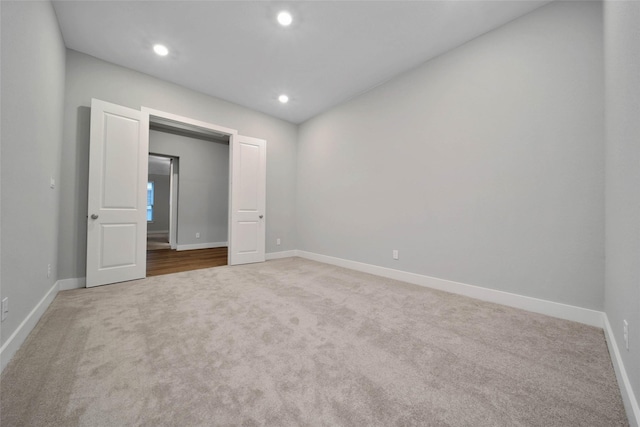 unfurnished bedroom with carpet flooring