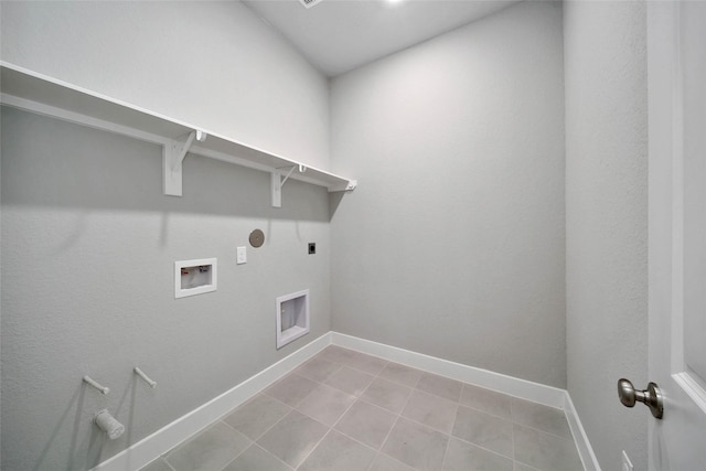 laundry area with hookup for a washing machine, hookup for a gas dryer, hookup for an electric dryer, and light tile patterned floors