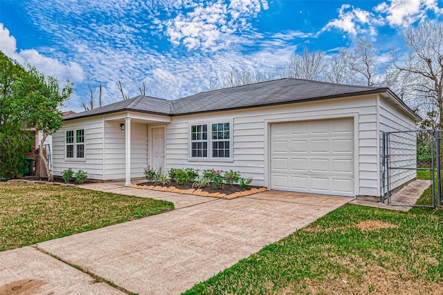 ranch-style house featuring a garage and a front yard