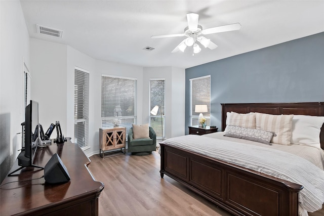 bedroom featuring ceiling fan and light wood-type flooring