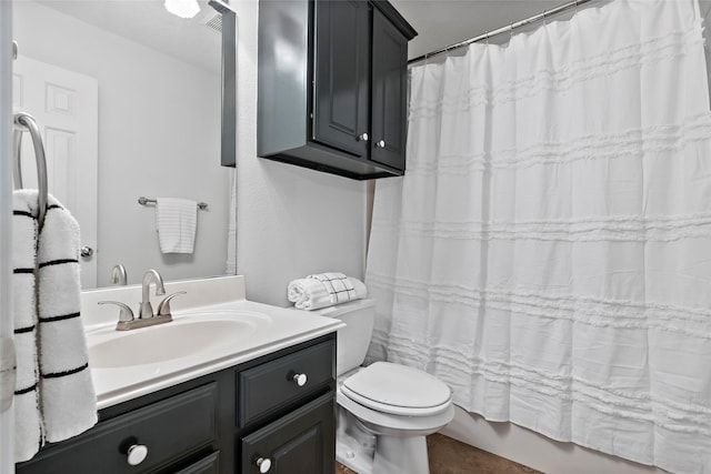 full bathroom with vanity, toilet, and shower / bath combo with shower curtain