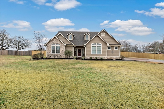 craftsman-style house with a front yard