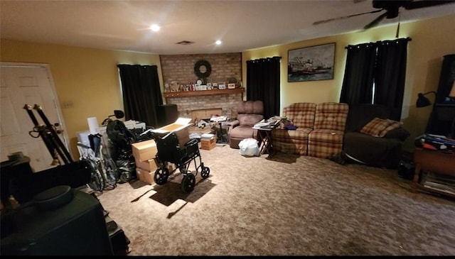 carpeted living area with a brick fireplace