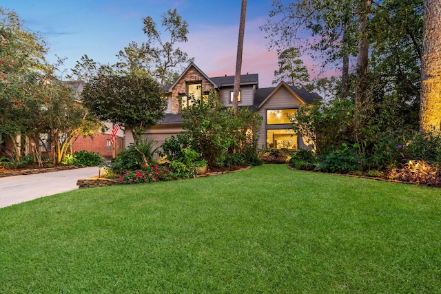 view of front of house with a lawn