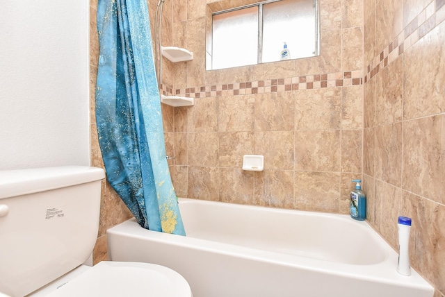 full bathroom with toilet and shower / tub combo with curtain