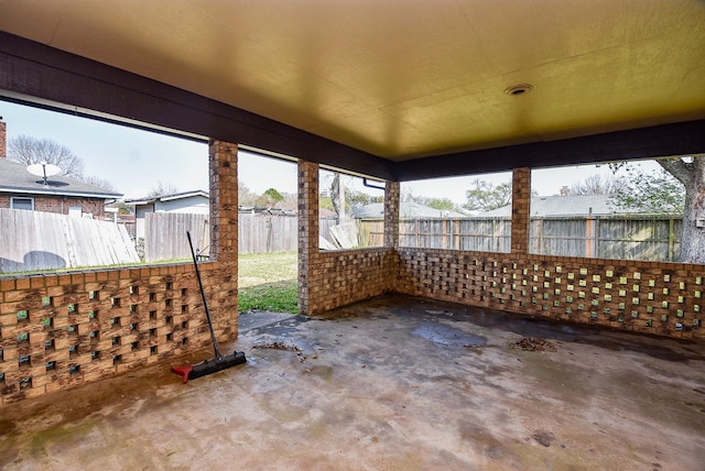 unfurnished sunroom featuring a wealth of natural light