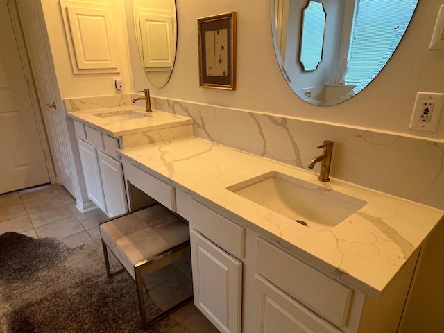 bathroom featuring tile patterned floors and vanity