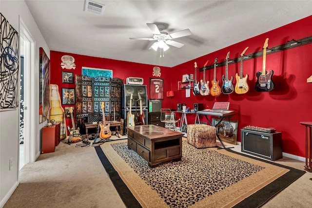 interior space with ceiling fan and carpet