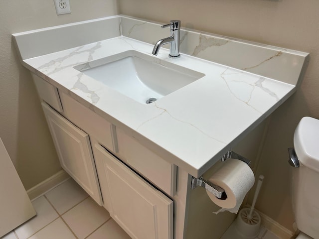 bathroom with vanity and tile patterned flooring