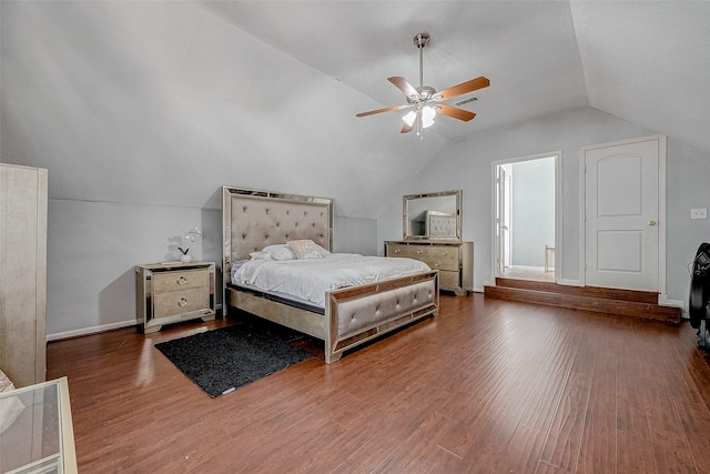 bedroom featuring ceiling fan, lofted ceiling, and wood-type flooring