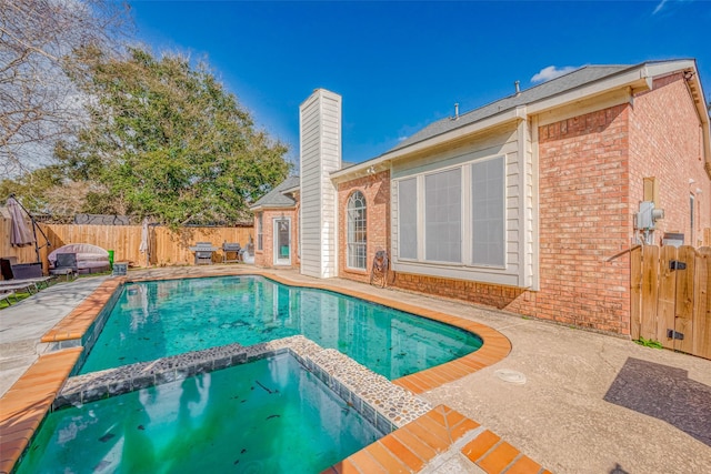 view of pool with a patio