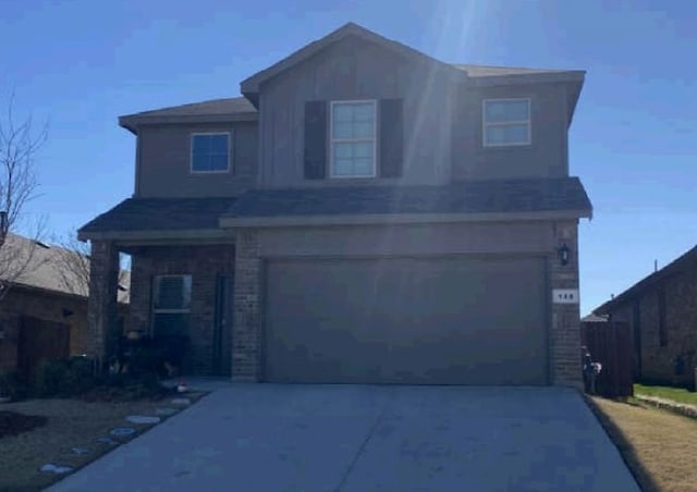 view of front of property featuring a garage