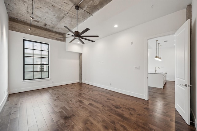 1714 Ashland Unit 303, Houston, TX 77008 - spare room with baseboards, ceiling fan, dark wood-style floors, recessed lighting, and a sink
