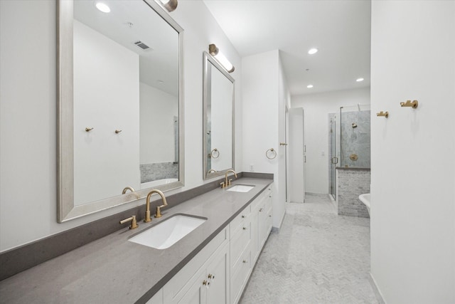 1714 Ashland Unit 303, Houston, TX 77008 - full bathroom featuring double vanity, recessed lighting, a shower stall, and a sink