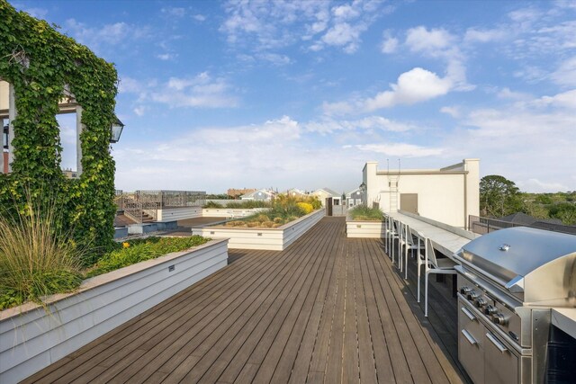 1714 Ashland Unit 303, Houston, TX 77008 - wooden terrace featuring a grill