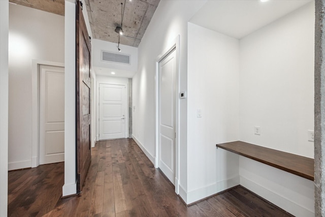1714 Ashland Unit 303, Houston, TX 77008 - hall featuring baseboards, dark wood finished floors, and visible vents