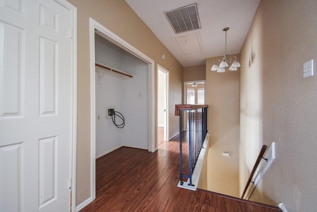 hallway with dark hardwood / wood-style flooring