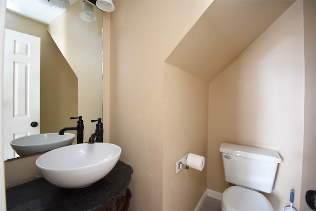 bathroom featuring toilet and sink