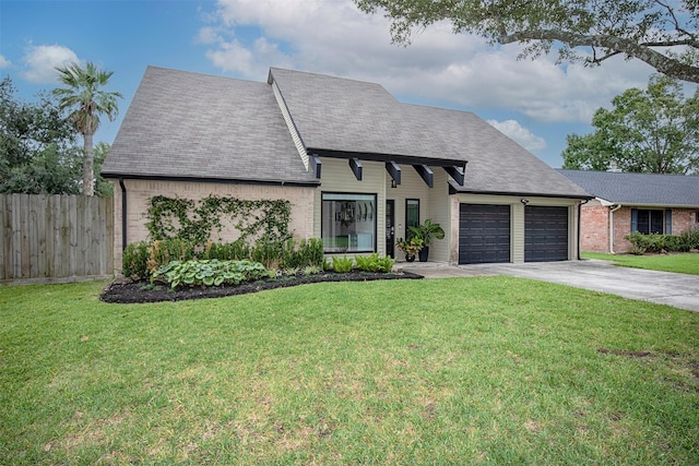 view of front facade with a garage and a front yard