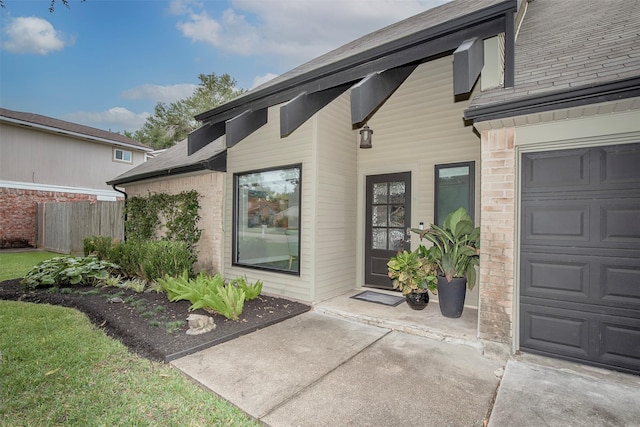 property entrance with a garage