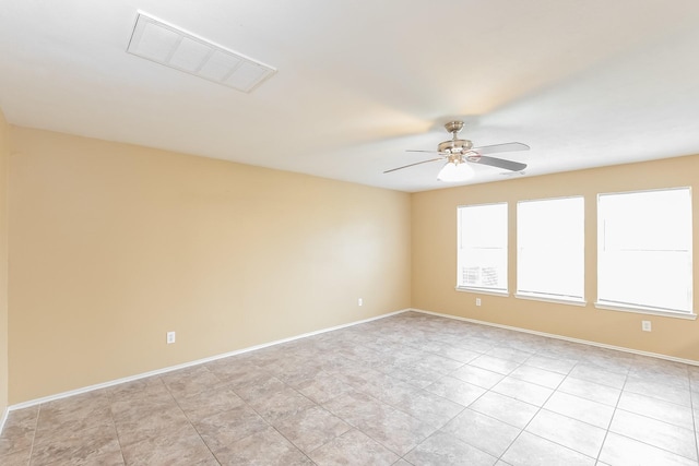 unfurnished room featuring ceiling fan