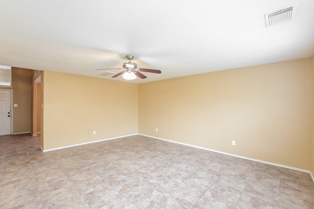 spare room with ceiling fan