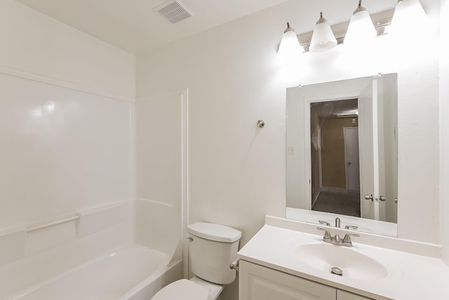 full bathroom with shower / bath combination, vanity, and toilet