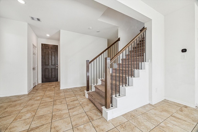 view of tiled foyer entrance