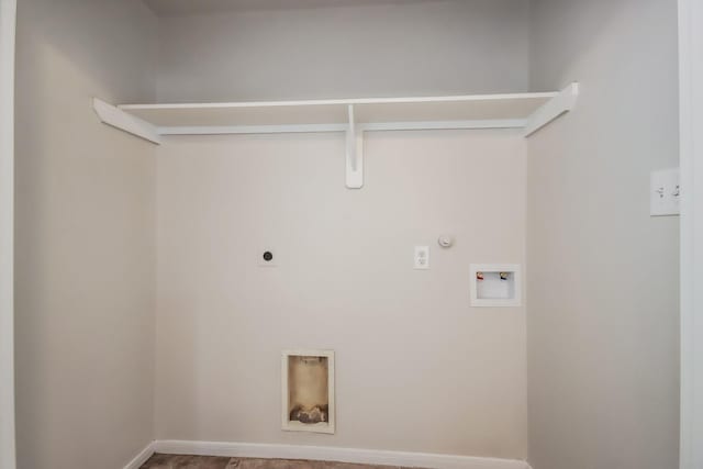 laundry area featuring gas dryer hookup, washer hookup, and hookup for an electric dryer