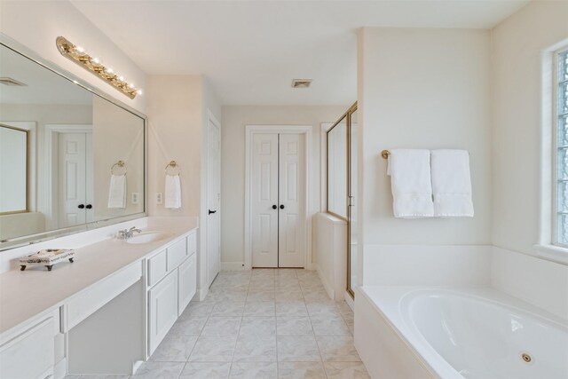 bathroom with vanity and plus walk in shower