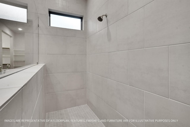 full bath featuring a tile shower